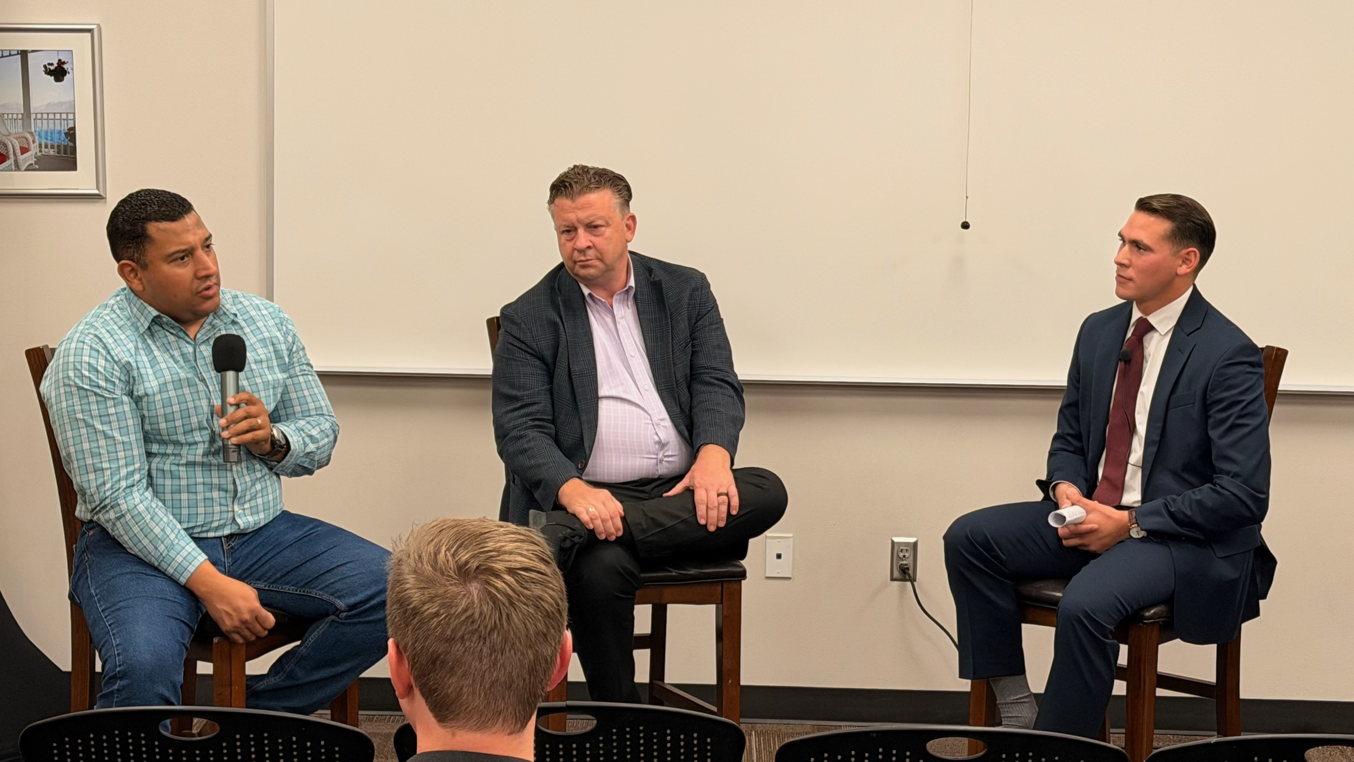 Utah State Senator Todd Weiler and Salt Lake County Councilman Carlos Moreno in conversation with UELF President Seth A. Villagomez